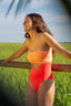Bañador Antares color coral naranja sin tirantes para mujer y teen de Moûtt Girls.
