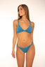 Bikini Asilah color turquesa con espalda cruzada y braga clásica para mujer y teen de Moûtt Girls.