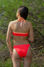 Bikini cruzado delantero para mujer y teen bicolor coral y naranja suave. Modelo Orilla de Moûtt Girls.