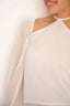 Blusa Marina Blanco semitransparente abrochada en el cuello para teens de Moutt Girls.