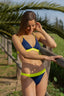 Bikini triángulo para mujer y teen bicolor marino y amarillo . Modelo Azores de Moûtt Girls.