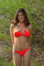 Bikini bicolor coral y naranja suave ideal para teens. Modelo Orilla de Moutt Girls.